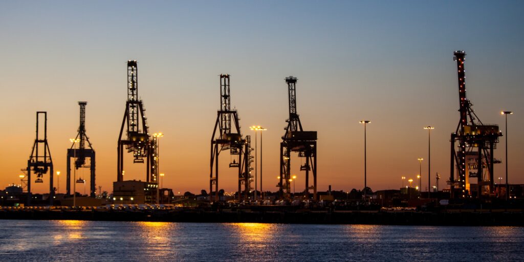 Cargo Cranes At Dusk